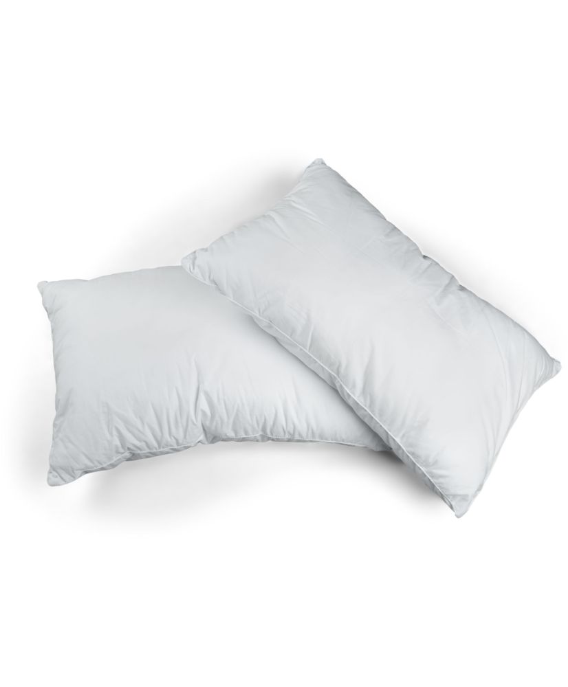 2 soft pillows in fluffy polyester microfibers, adjustable in height 60 x 60 cm 2 soft pillows in fluffy polyester microfibers, adjustable in height 60 x 60 cm