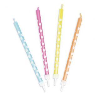  12 colored candles with white dots 