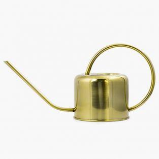 Vintage golden watering can