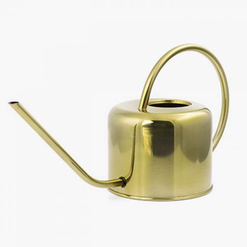 Vintage golden watering can
