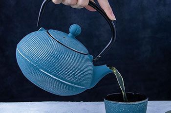 Glass, porcelain & cast iron Tea-pots